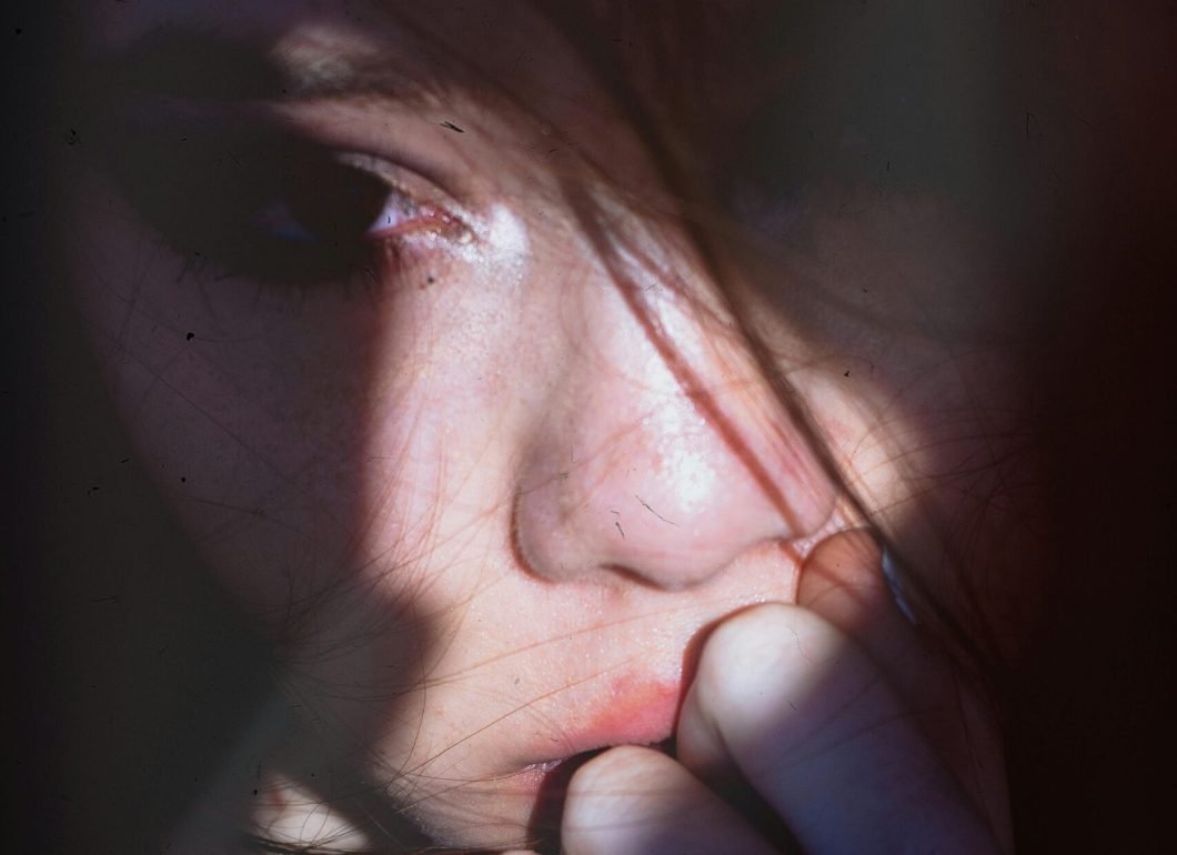 pexels-photo-4028485-4028485 Close-up portrait capturing deep emotion and introspection.
