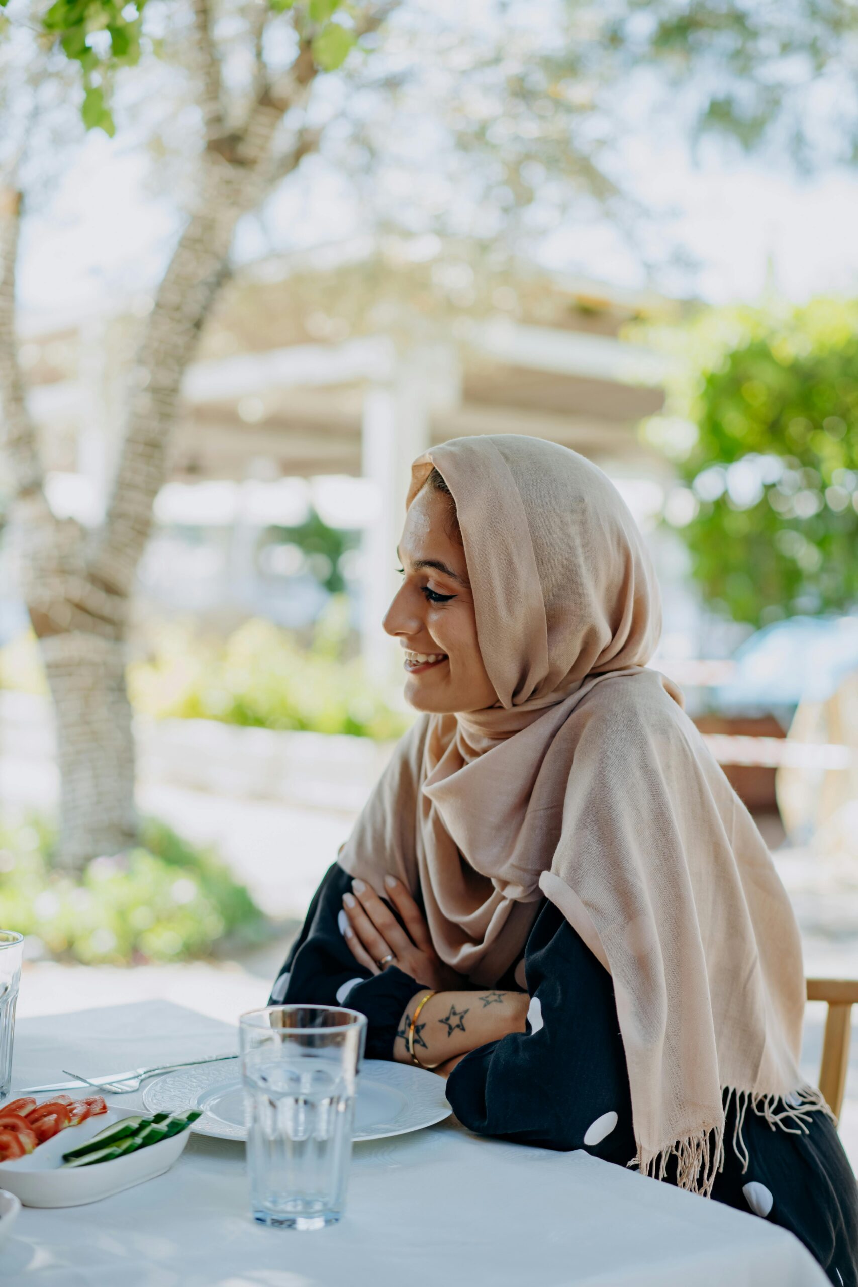 A Woman in Beige Hijab on a Date