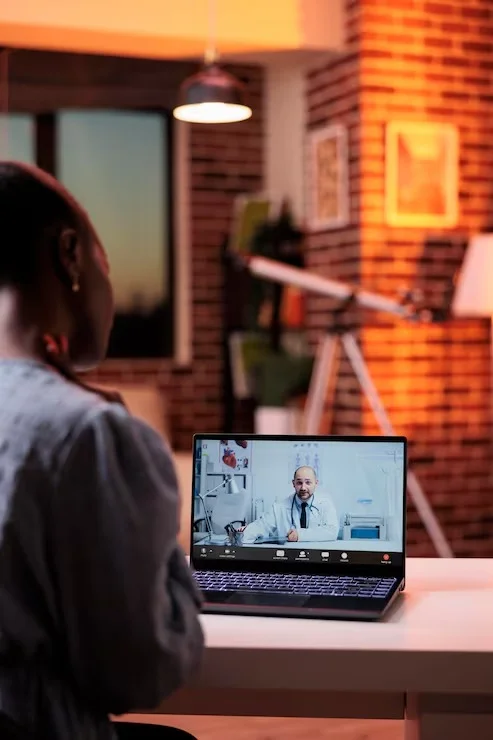 Client attending a remote teletherapy appointment from home through Mentally Healthy Care in Long Beach